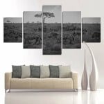 Afrikansk målning grupp av zebror på savannen. God kvalitet, original, hängde på en vägg ovanför en soffa i ett vardagsrum