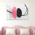 Skandinavisk rosa och svart bild. God kvalitet, original, hängde på en vägg ovanför en soffa i ett vardagsrum