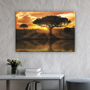 Afrikansk målning savannen solnedgång. God kvalitet, original, hängde på en vägg ovanför ett bord i ett hus